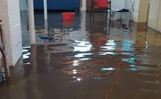 Basement with boiler, cabinets and washing machine completely flooded in Detroit, MI