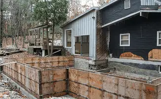 Prepared site with foundation forms for home remodeling and addition project in Detroit, MI