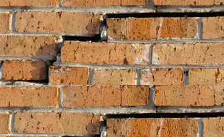 Brick wall with serious structural damage in Detroit, MI